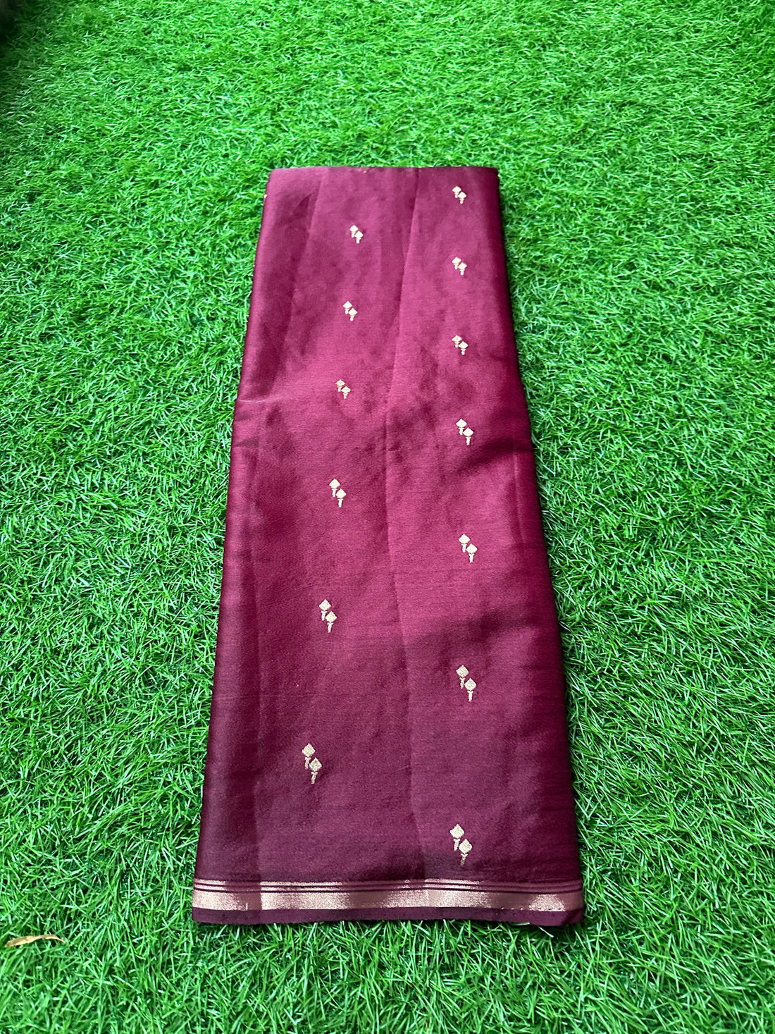 Maroon semi silk.