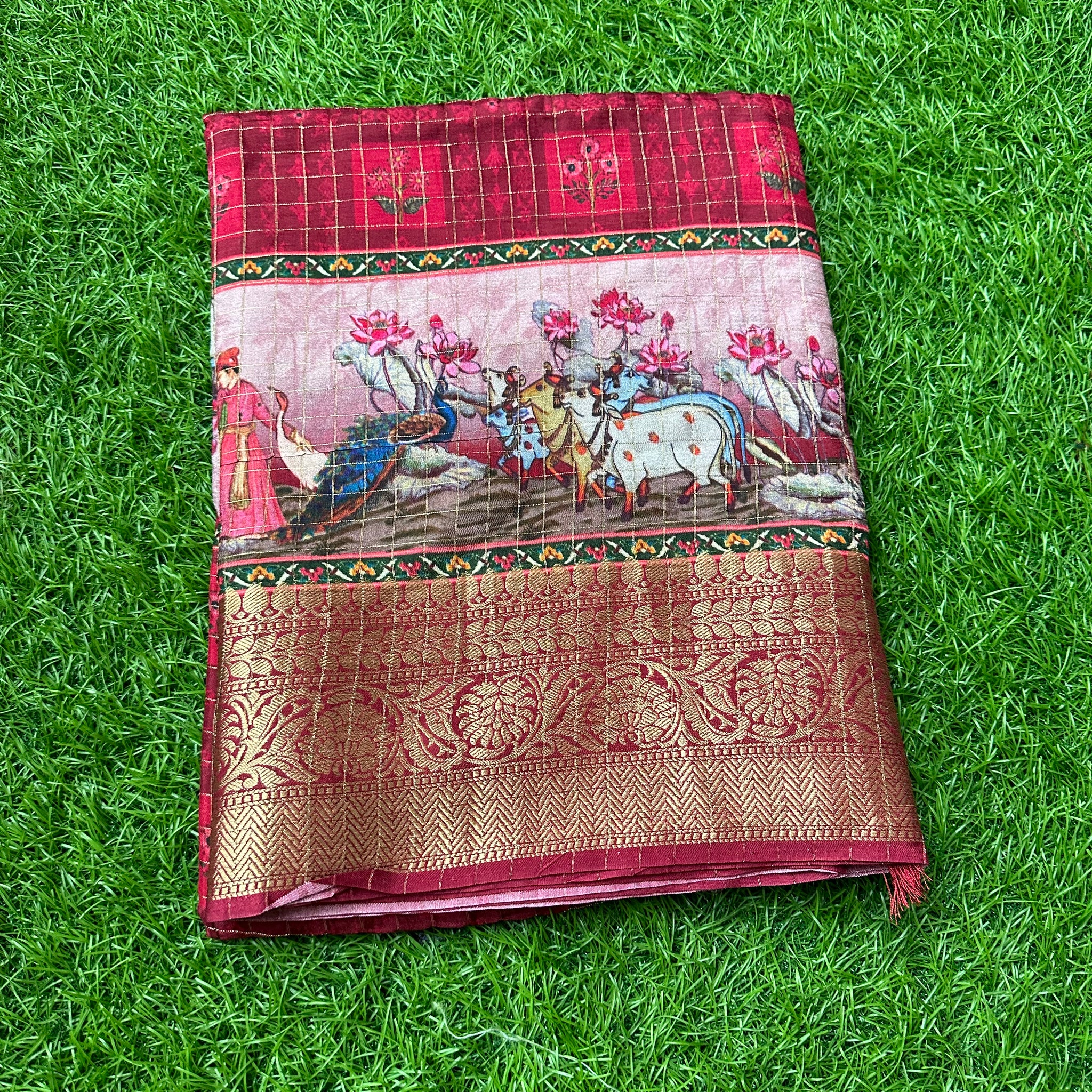 Maroon dola crepe with kalamkari border.