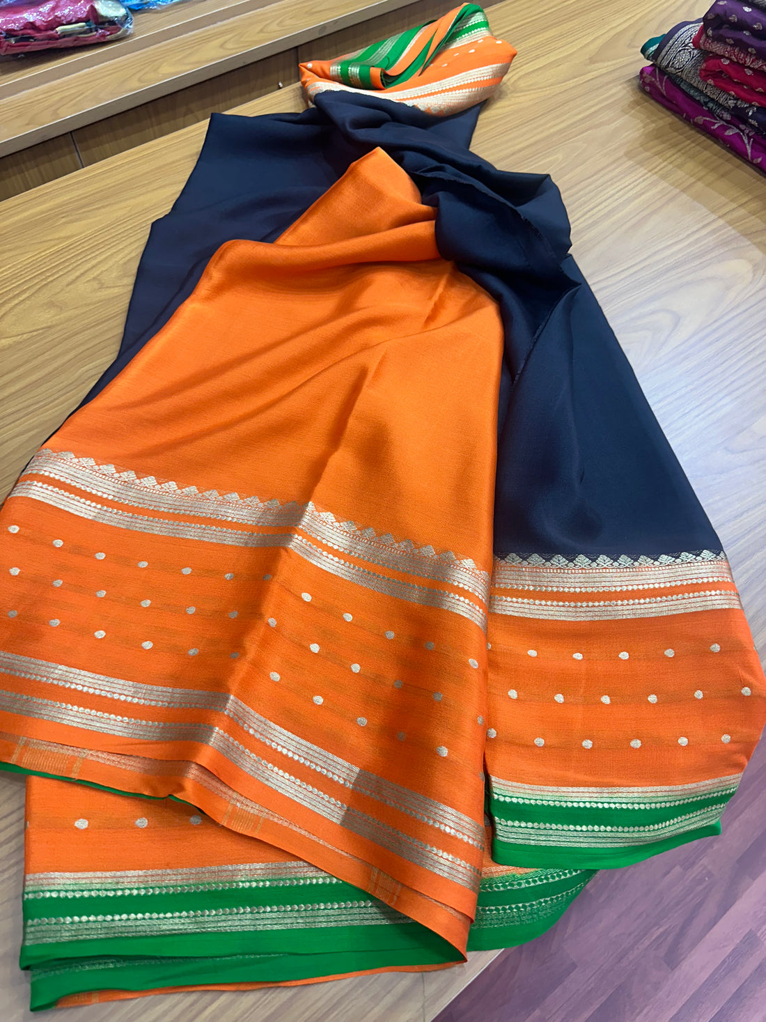 Black and orange pure crepe Mysore Silk 120 gsm