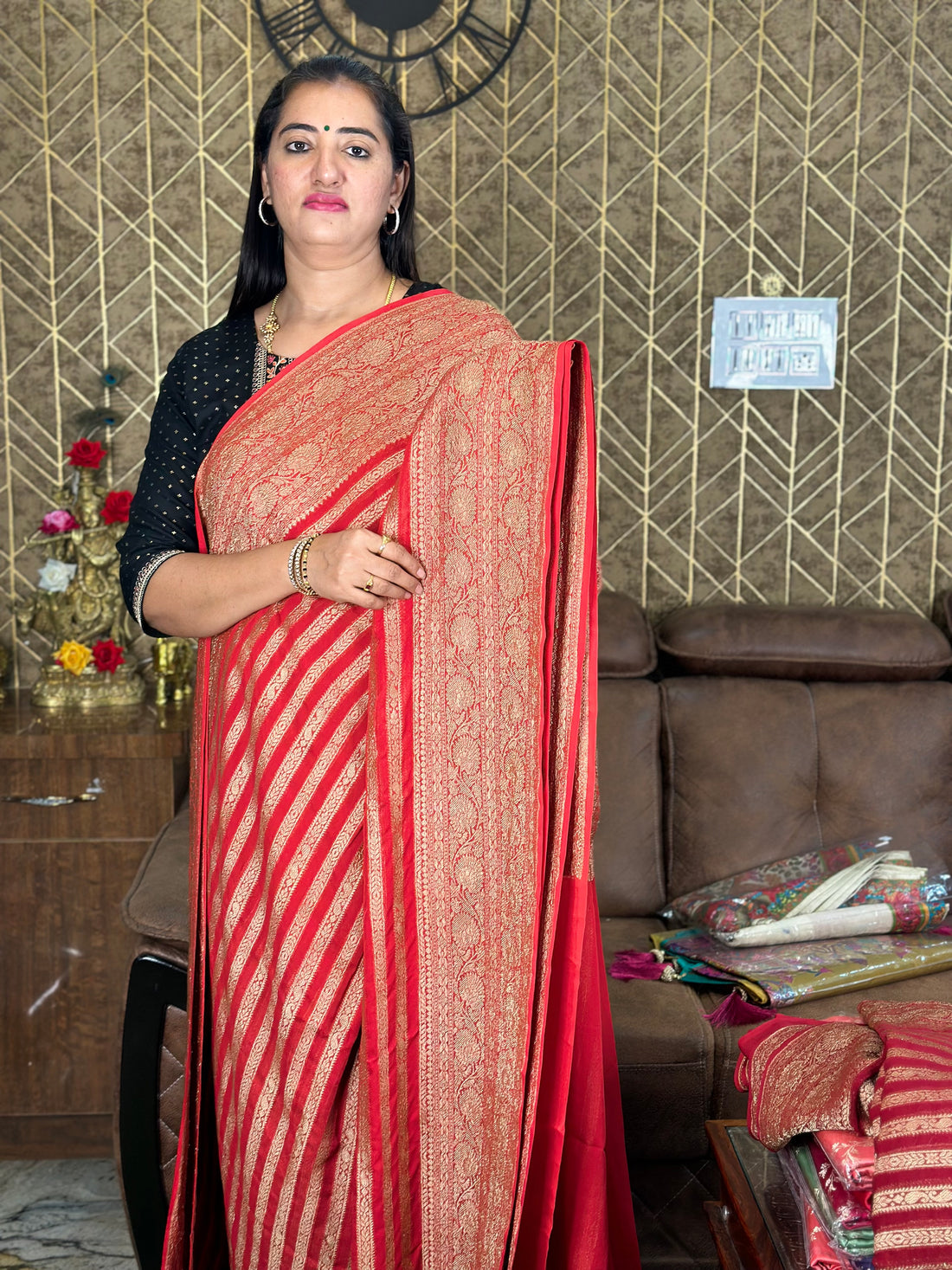 Hot red pure khaddi Georgette in stripes.