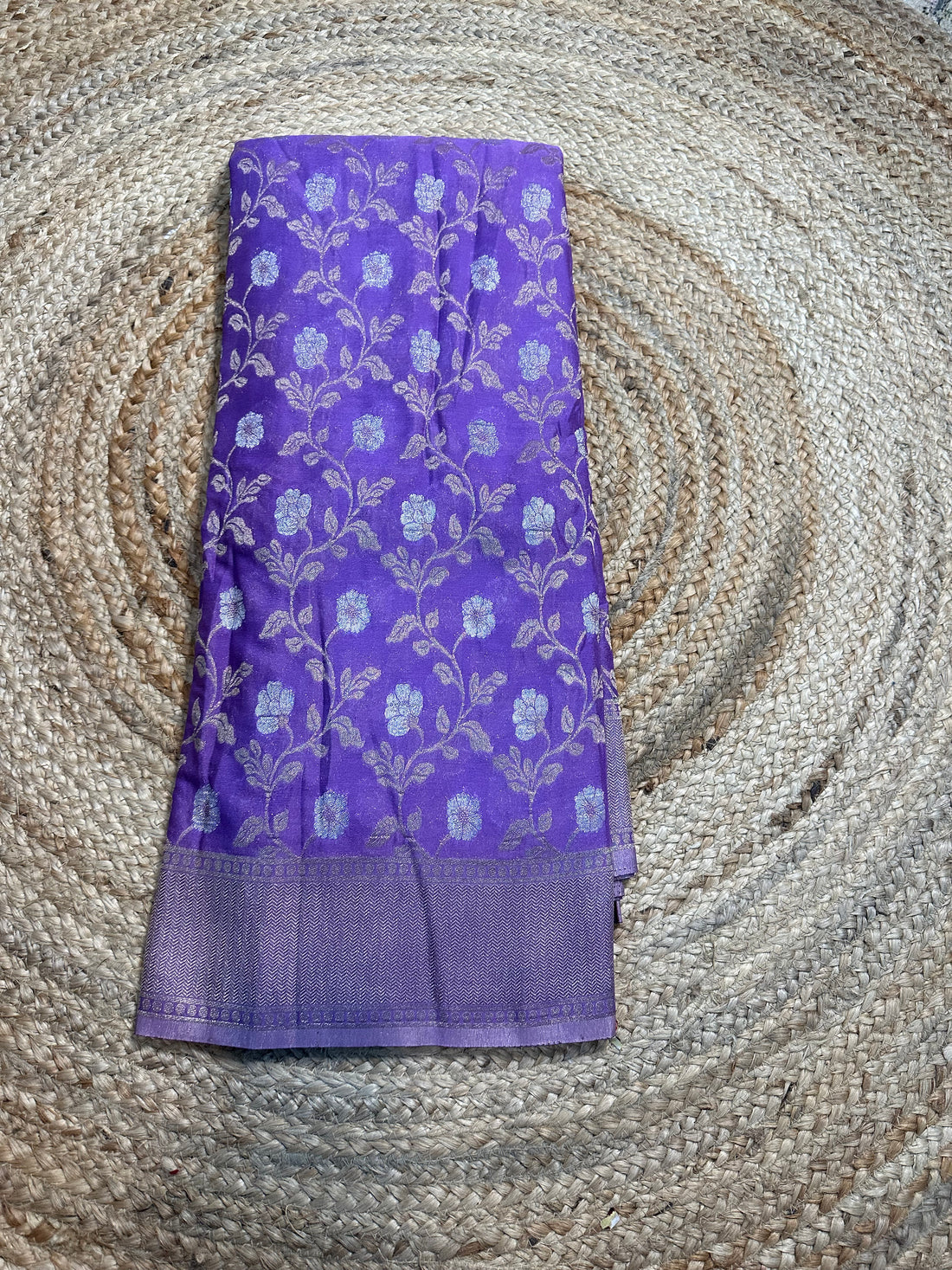 Lavender designer georgette in jaal pattern.