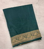 Dark Rama green Kanchi border plain modal silk saree