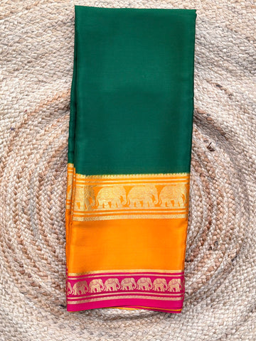Mysuru Silk Crepe- Elephant 3 D Border (120 gsm) Green with orange and  pink border