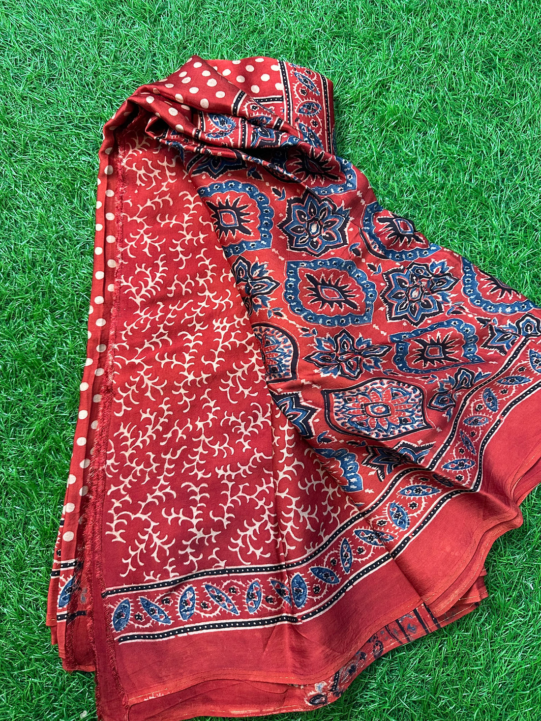 Red pure modal silk saree.