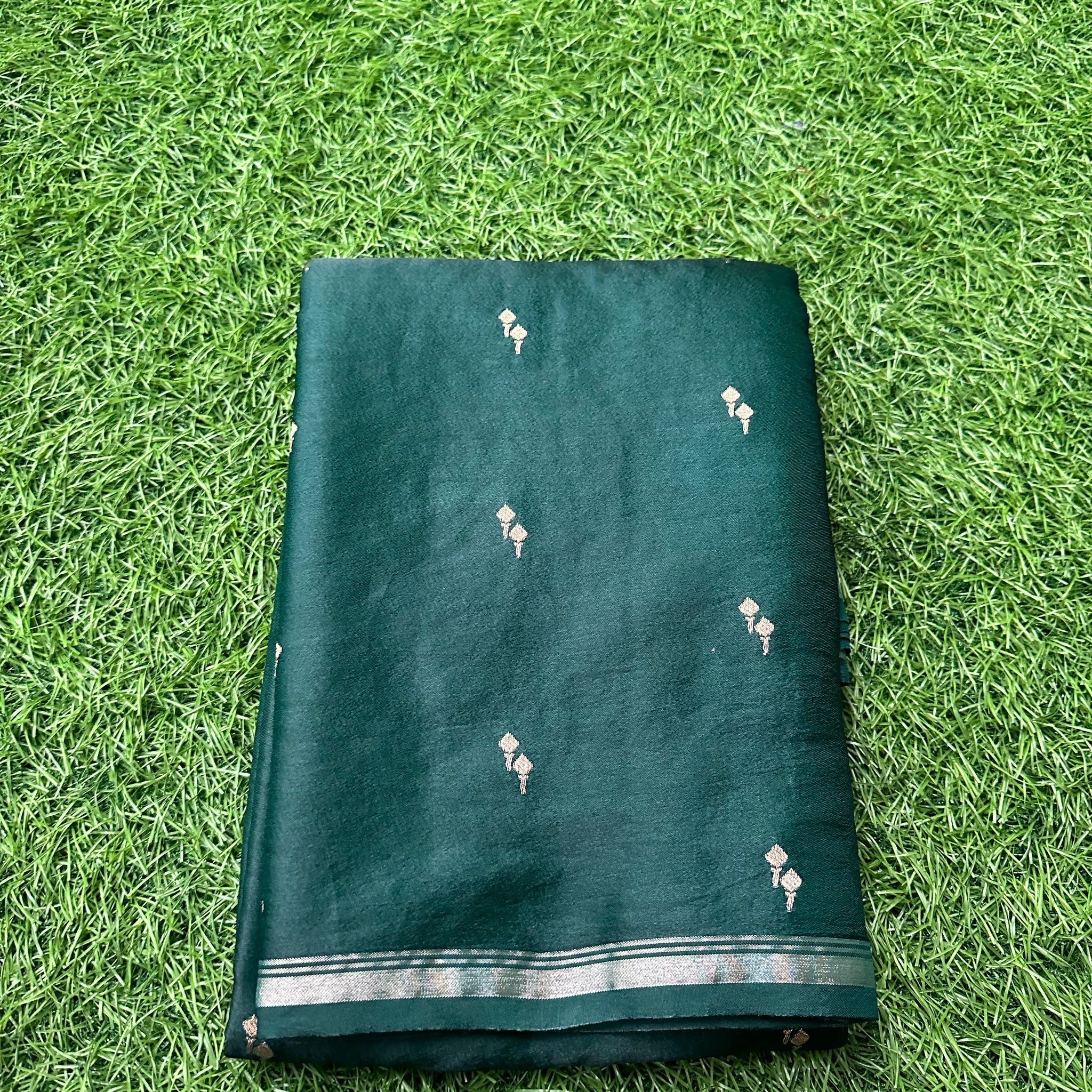 Dark green semi silk.