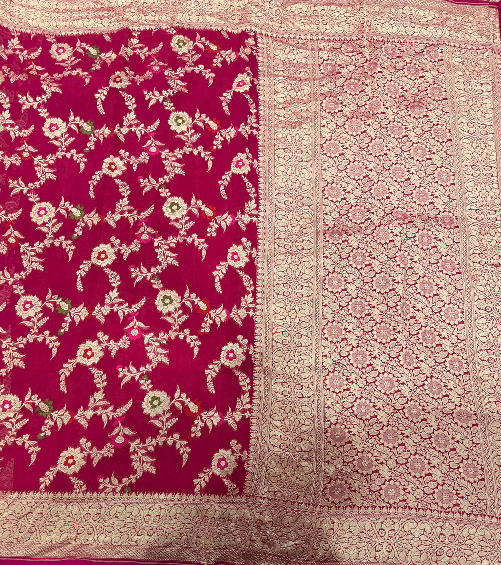 Rani pink  jaal pattern pure georgette with water zari saree