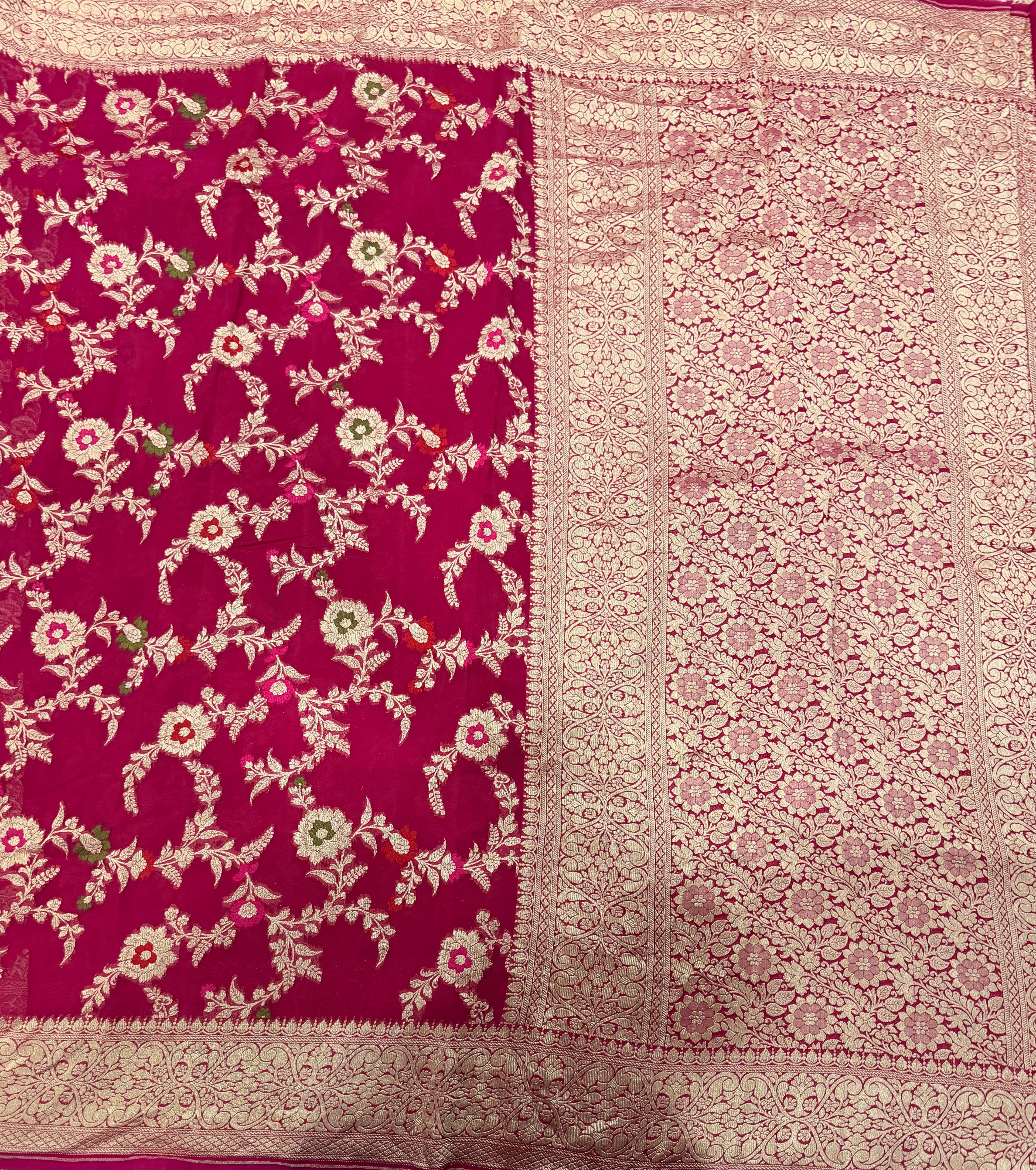 Rani pink  jaal pattern pure georgette with water zari saree