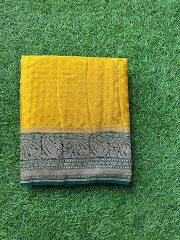 Mustard with green,pure crepe Banaras handloom silk sarees.