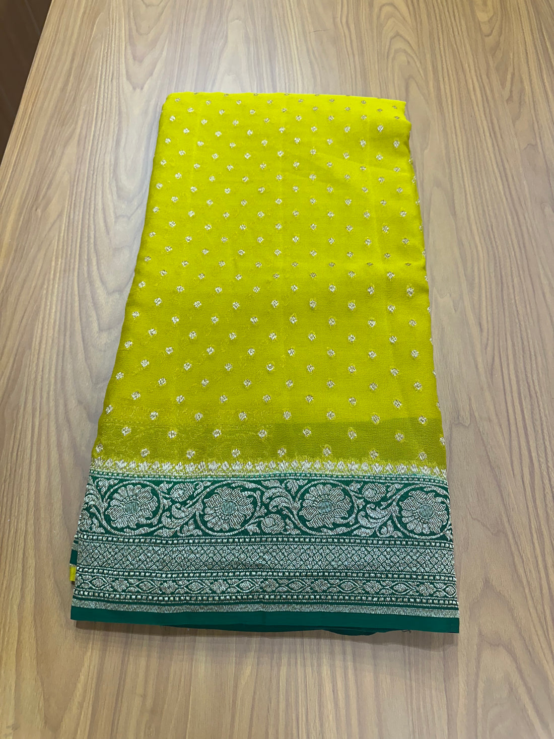 Neon green and bottle green pure khaddi Georgette sarees