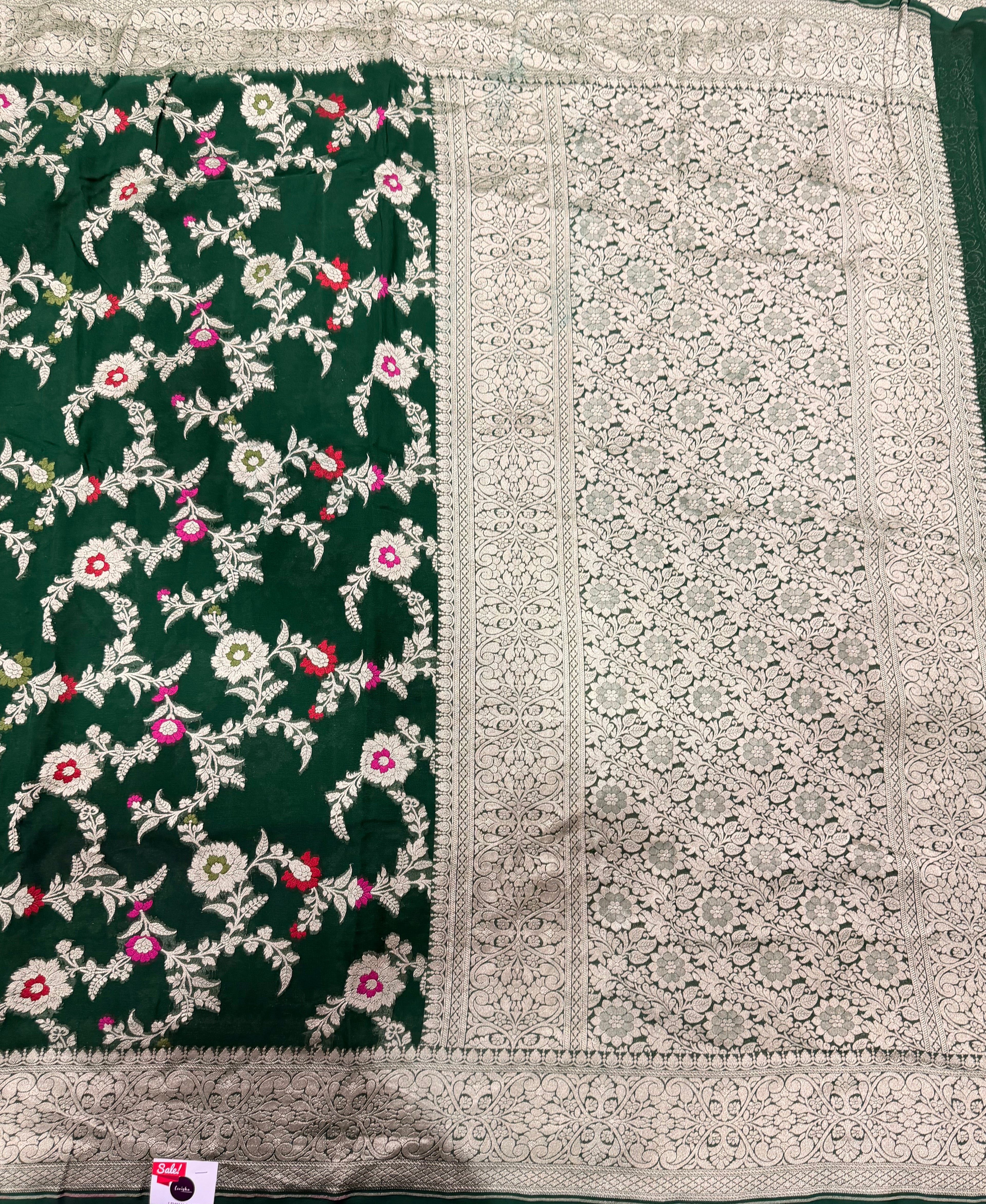 Bottle green jaal pattern pure georgette with water zari saree