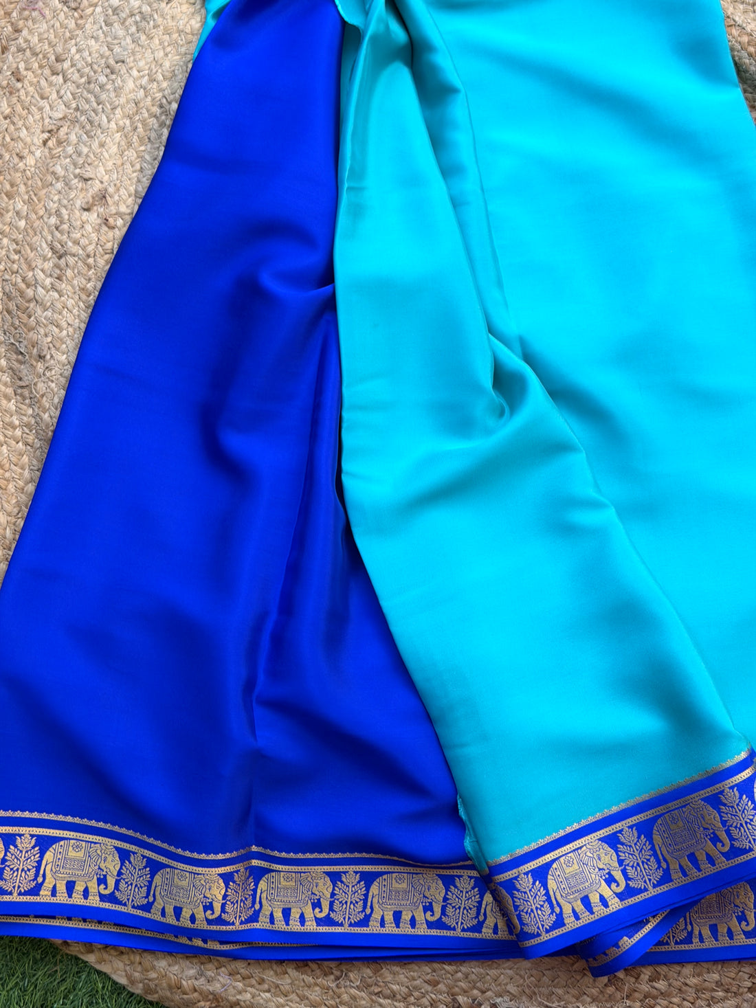 Sky blue and royal blue elephant border crepe Mysore silk 120gsm
