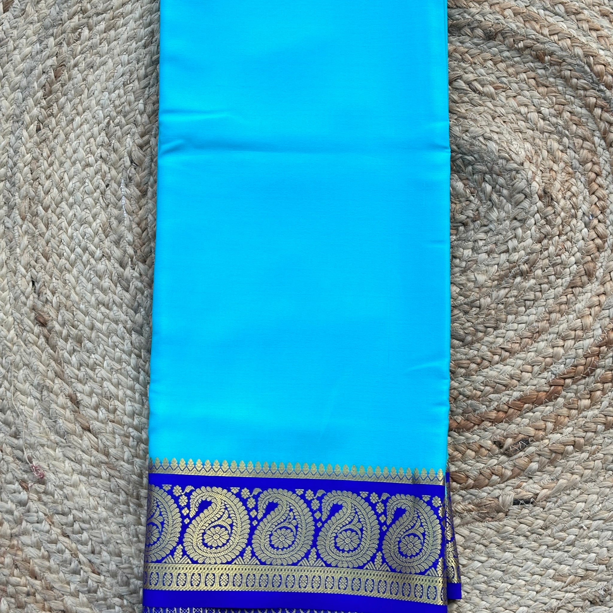 Sky blue with royal blue mango border 120 gsm pure crepe Mysore Silk