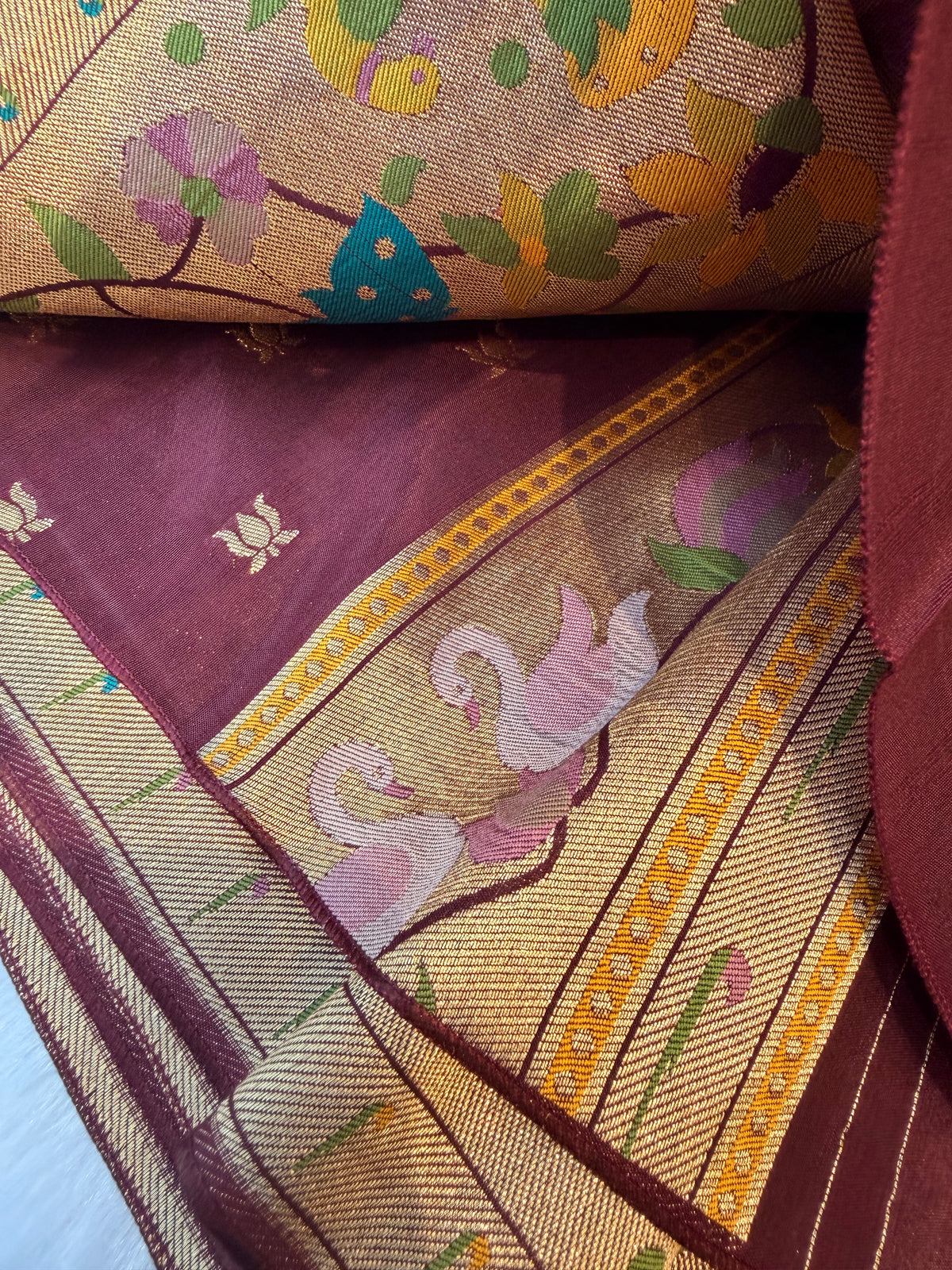 Brown pure paithani swan & peacock border saree