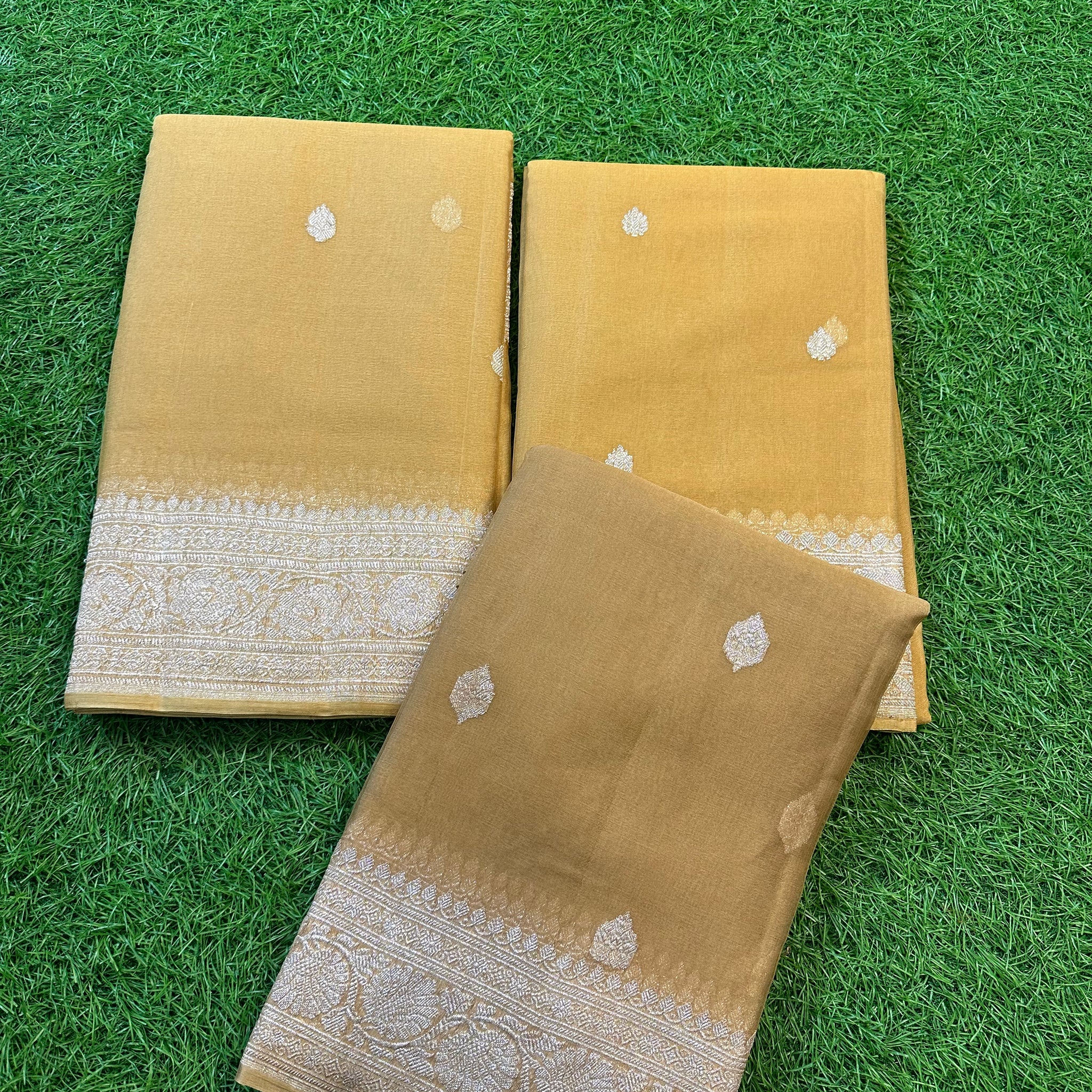 Pure Khadi chiffon in chili colour with silver zari.
