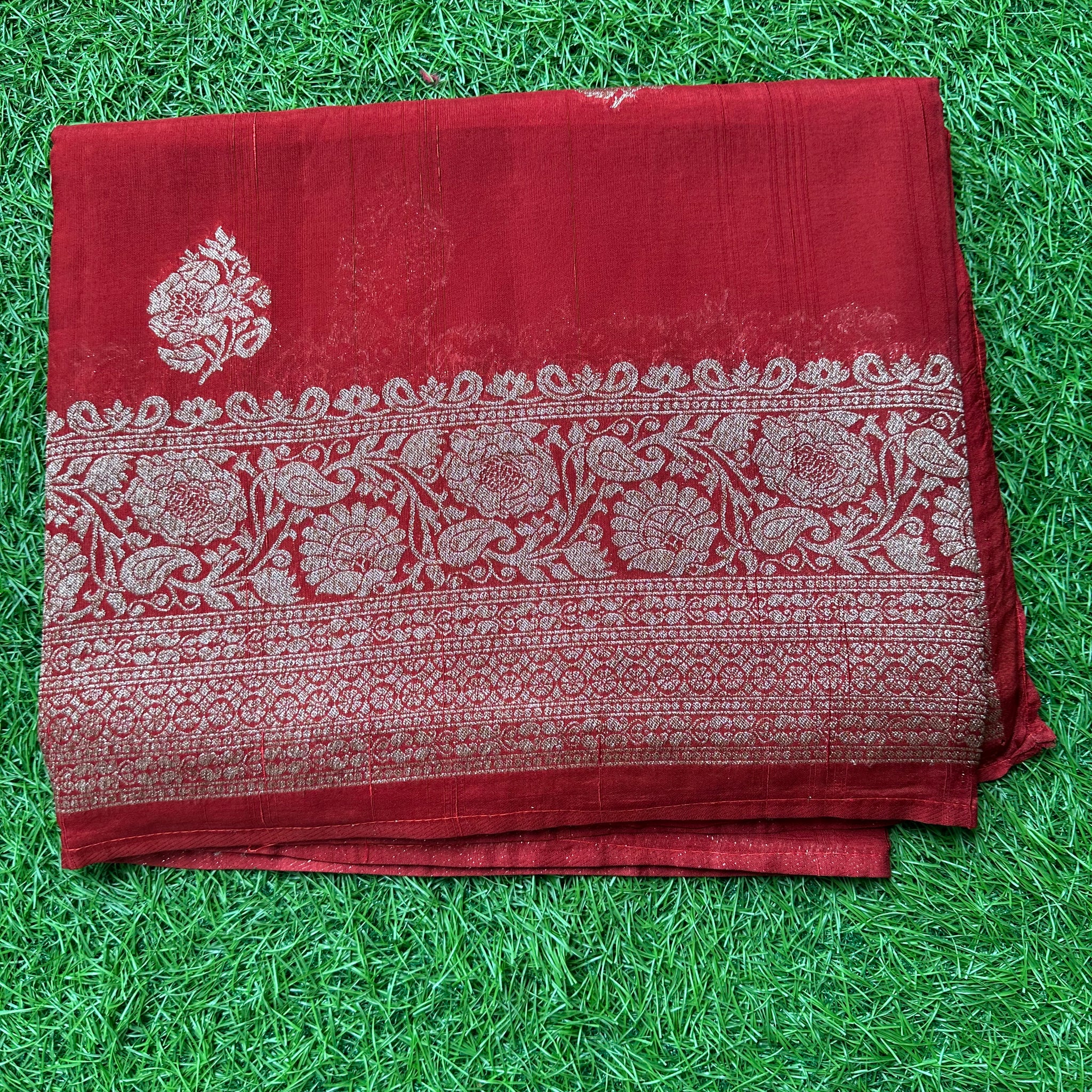 Brick red semi raw silk Banaras.