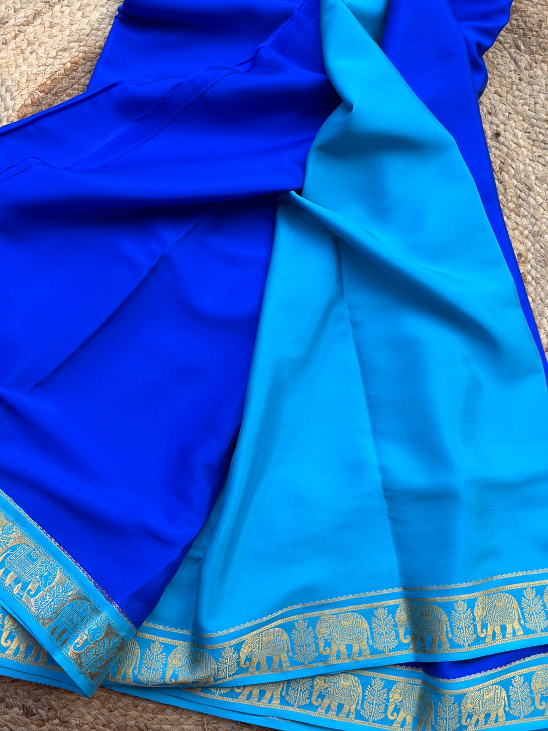 Royal blue and sky blue elephant border crepe Mysore silk 120gsm