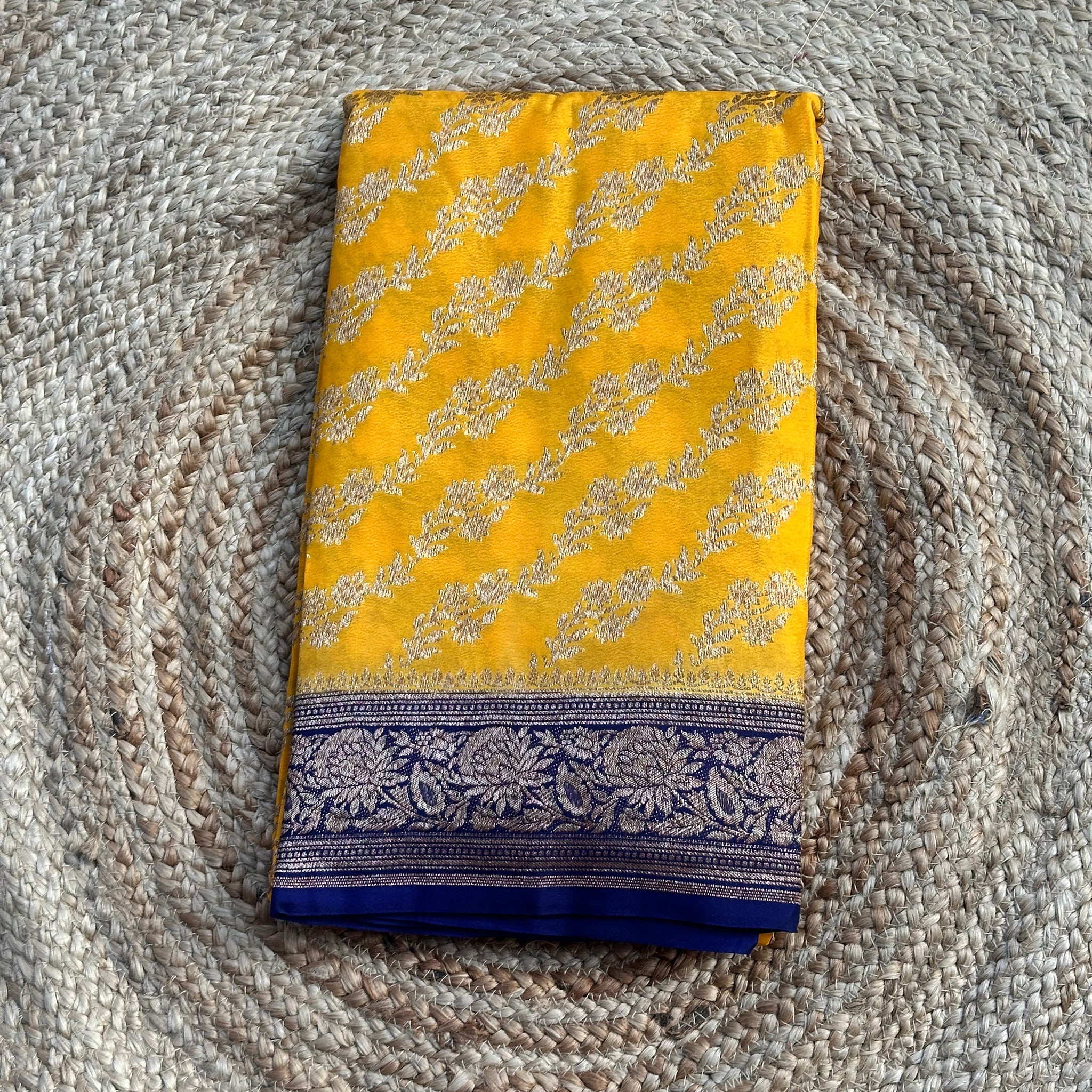 Yellow and purple pure crepe chiffon jaal pattern Saree