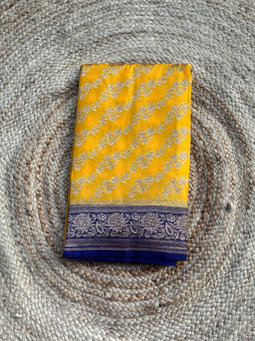 Yellow and purple pure crepe chiffon jaal pattern Saree