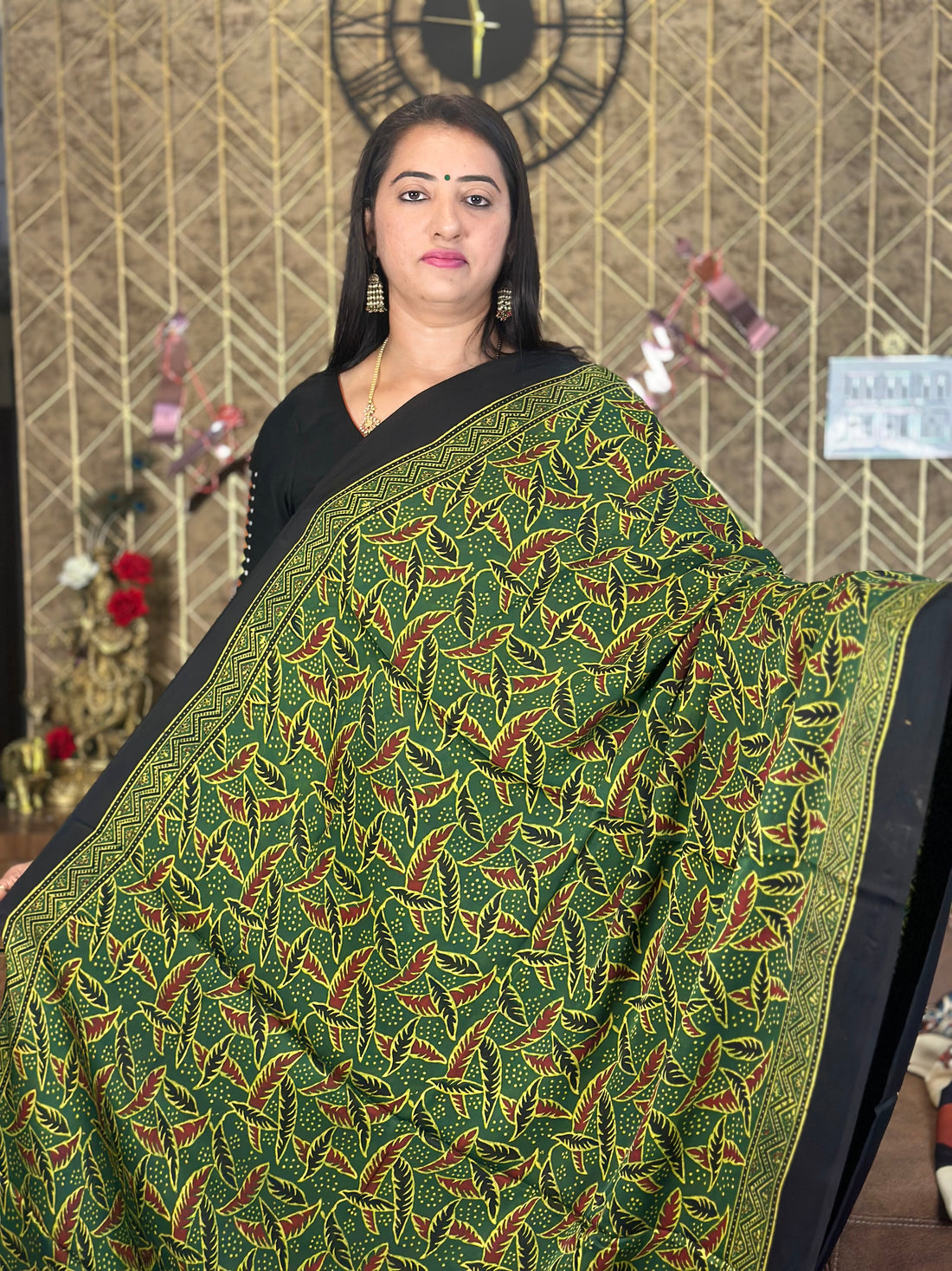 Green pure modal silk saree. Ajrak prints.