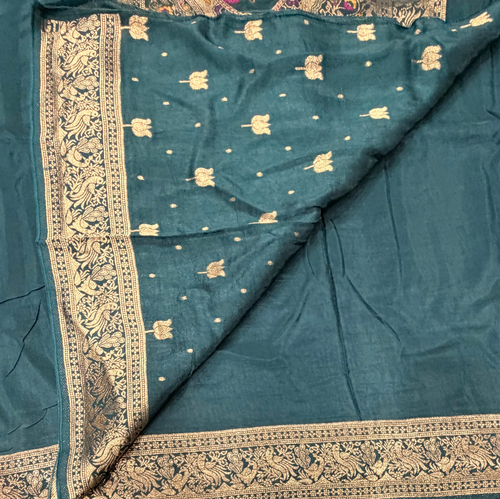 Dark Rama green Kanchi border plain modal silk saree