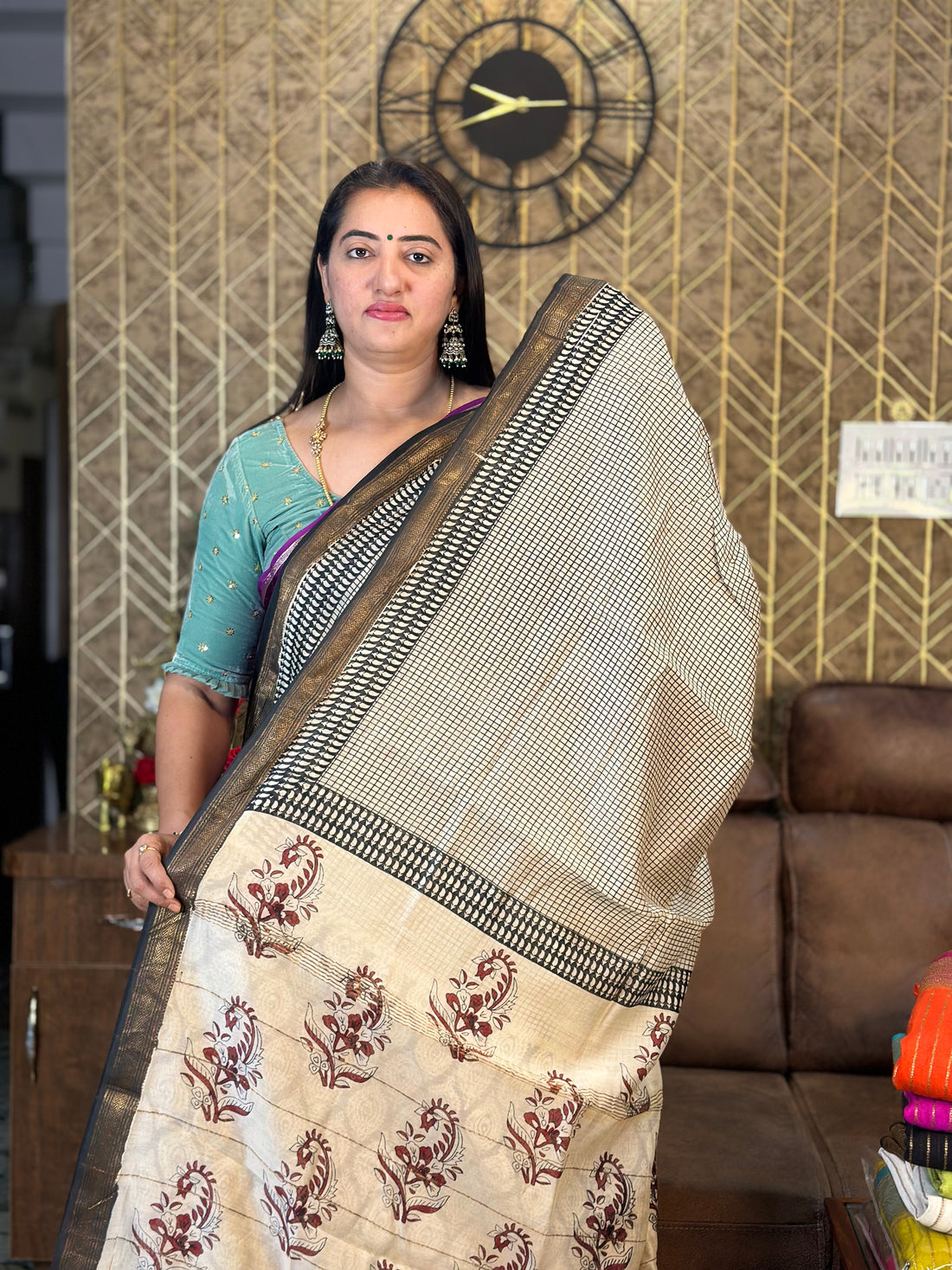 Maheshwari silk sarees. Small checks all over the body.