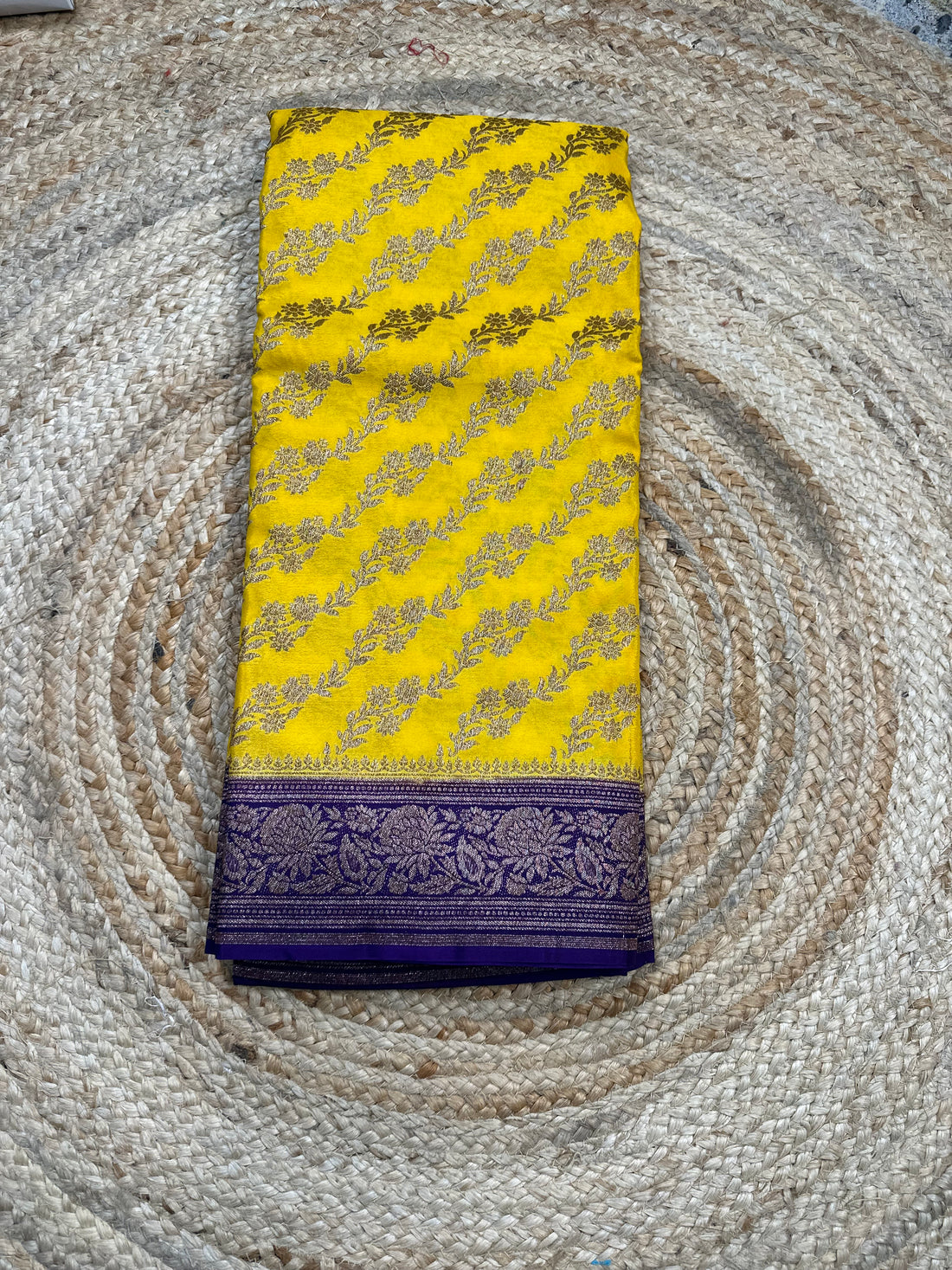 Yellow and purple crepe chiffon sarees.