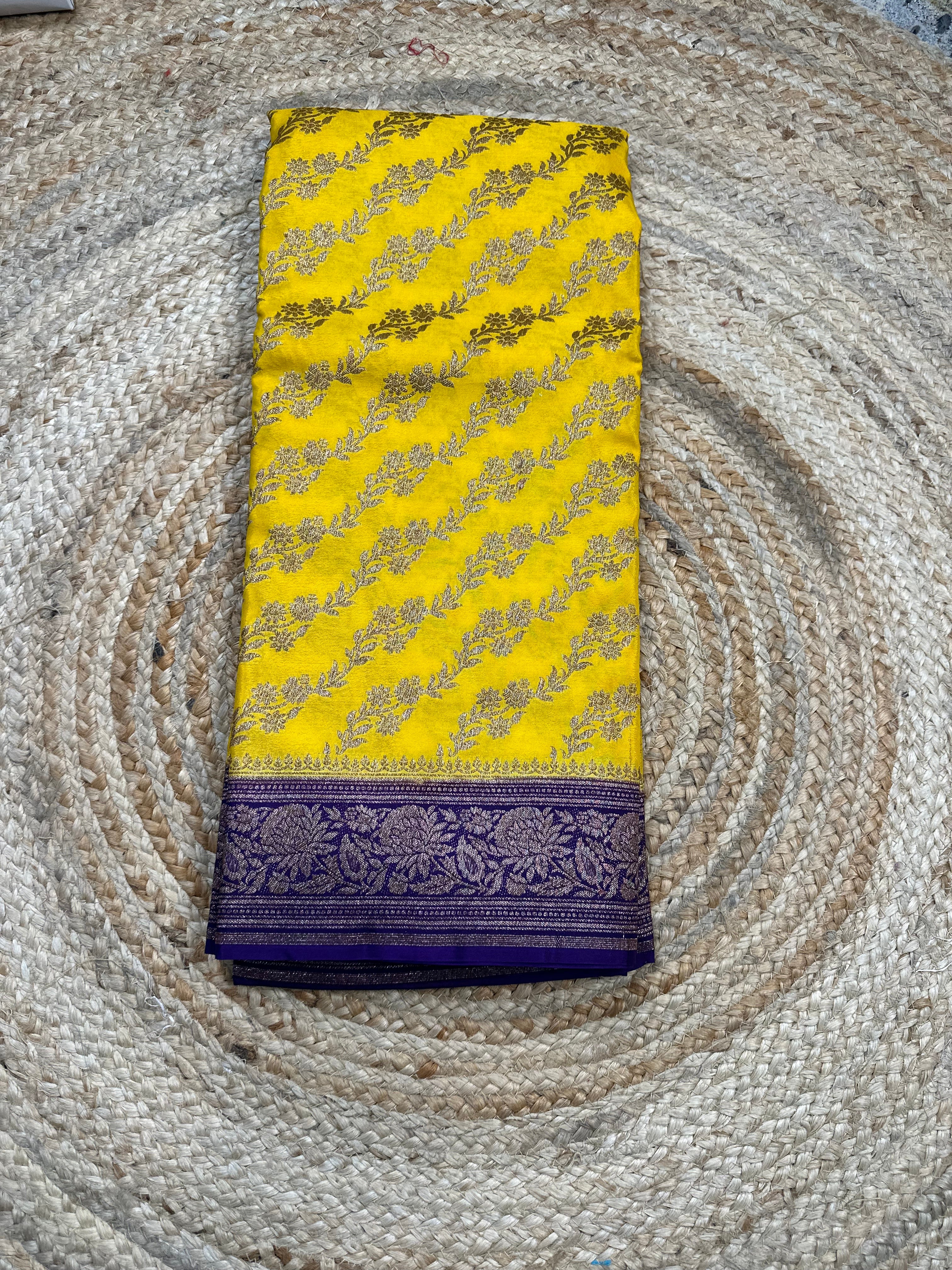 Yellow and purple crepe chiffon sarees.