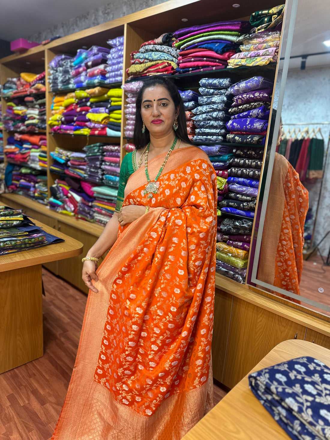 Orange designer georgette sarees