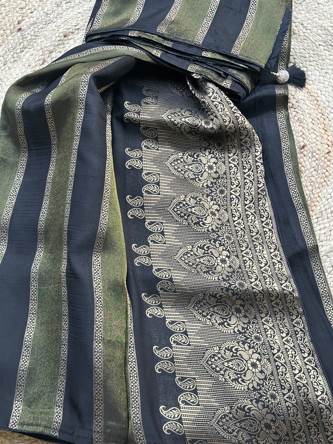 Green with black vertical stripes Saree