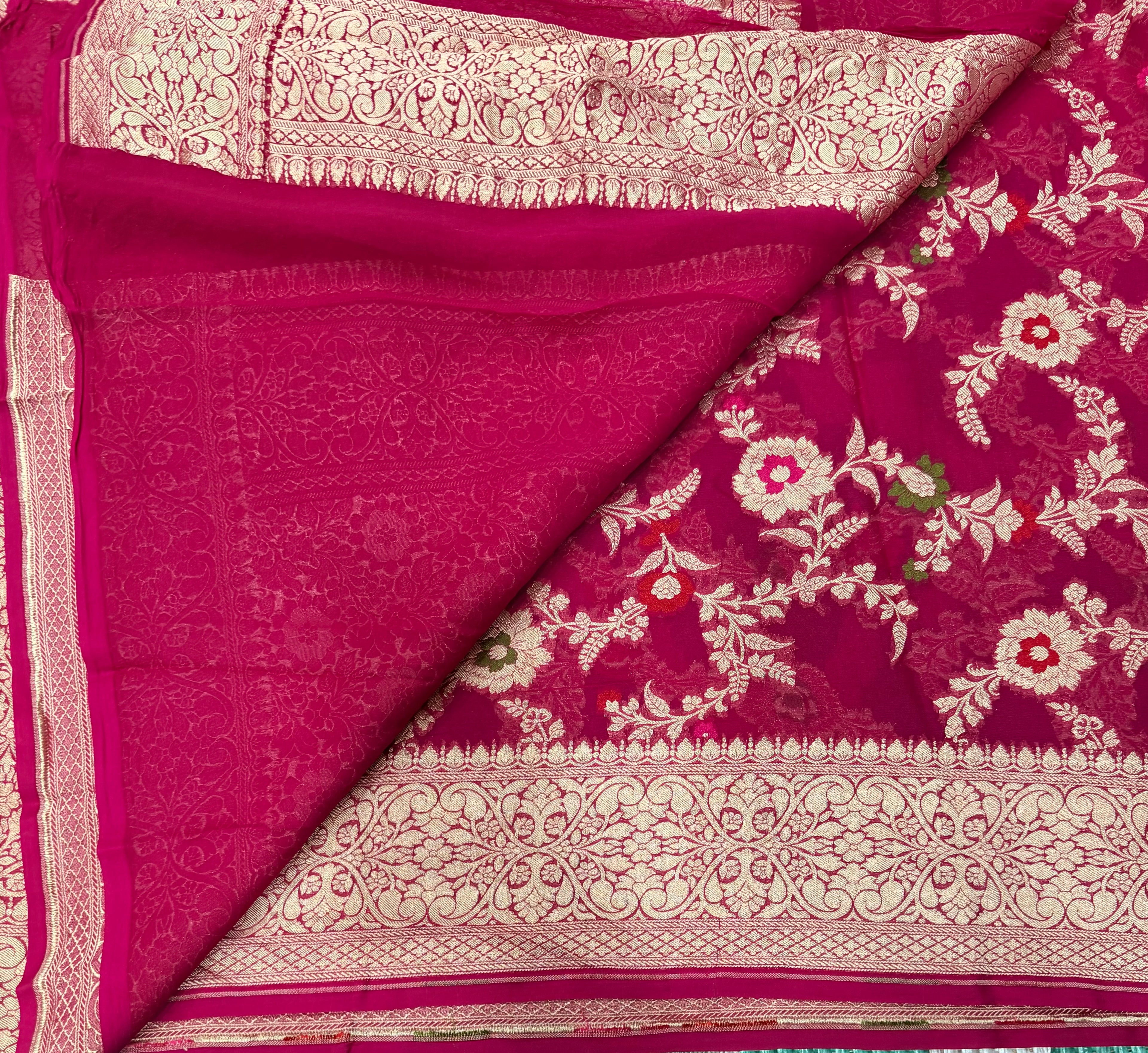 Rani pink  jaal pattern pure georgette with water zari saree
