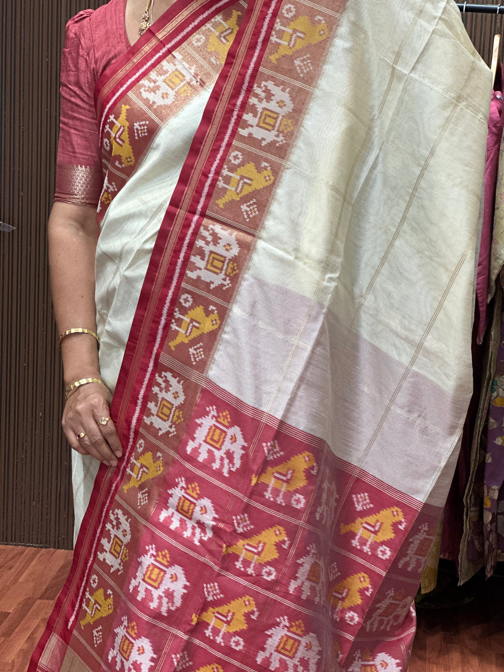 Tusser with Patola weaving Contrast border.half white with pink.