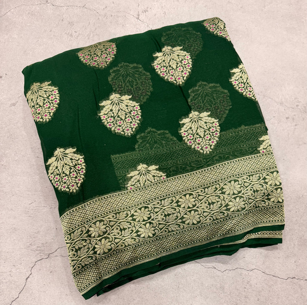 Bottle green pure georgette with water zari saree