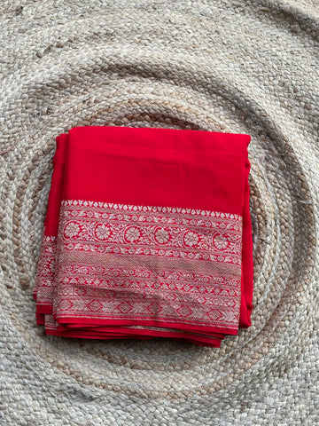Hot red pure crepe Banaras plain saree with Jaal Pattern blouse