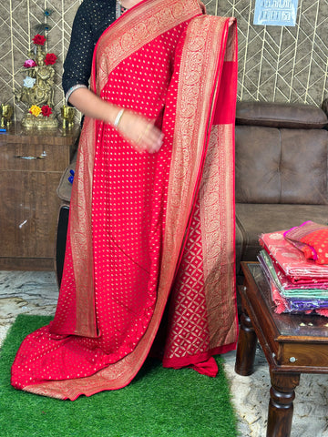 Hot red pure crepe Banaras sarees.