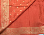 Rust orange Kanchi border plain modal silk saree