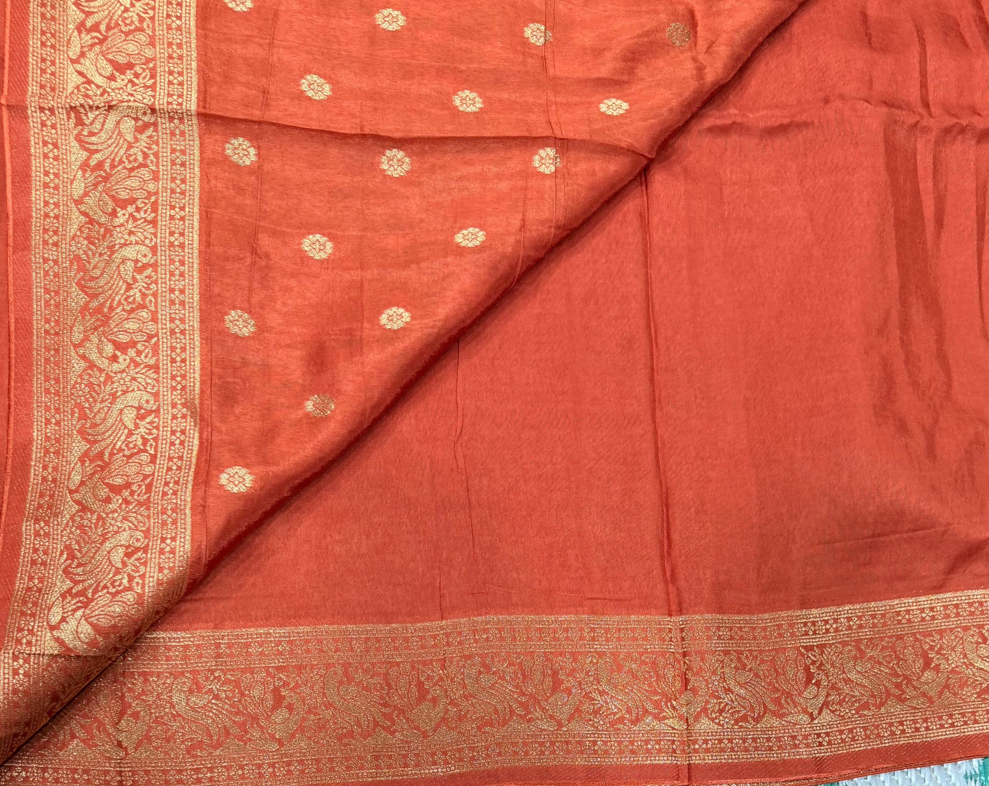 Rust orange Kanchi border plain modal silk saree