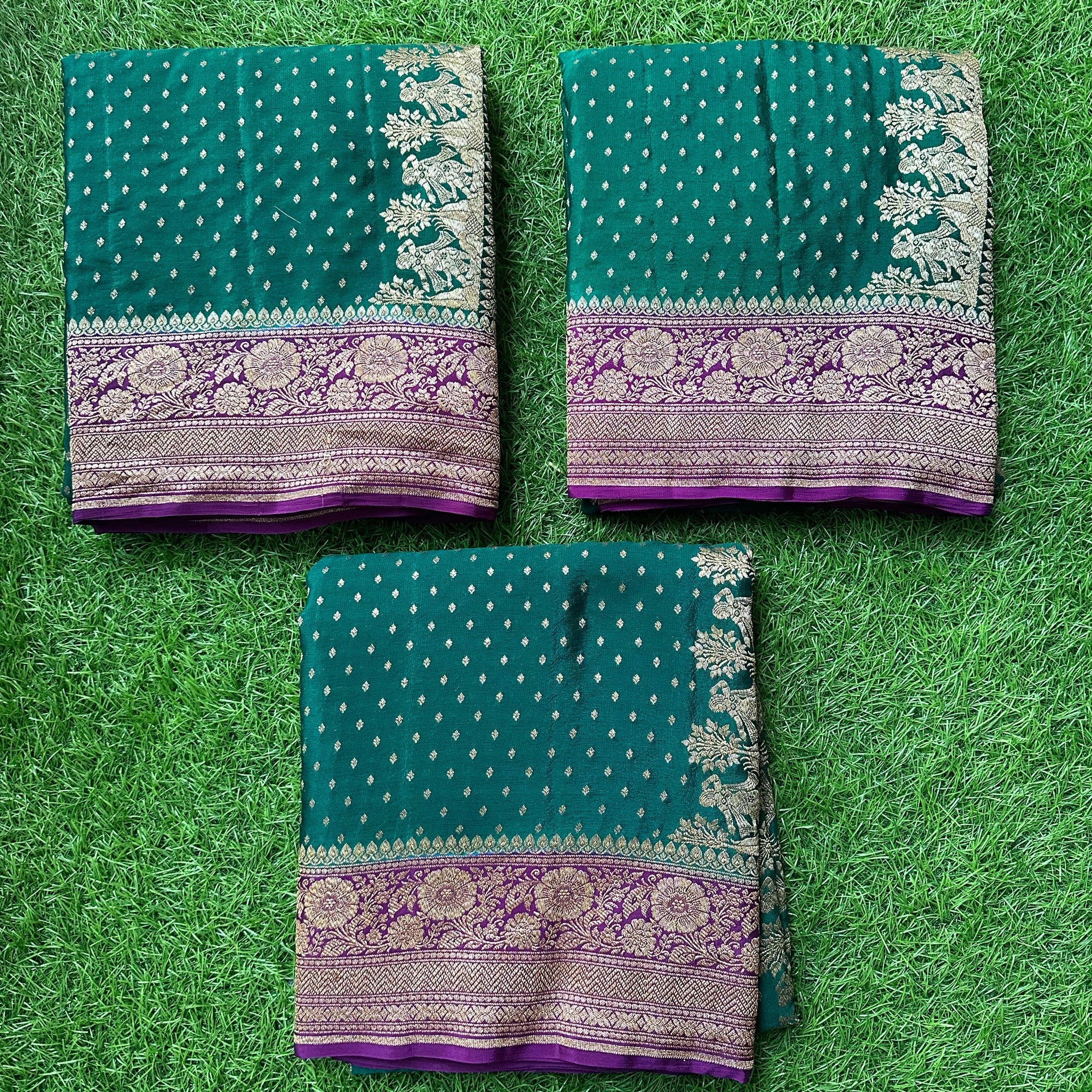 Peocock green with mejentha pure crepe Banaras handloom silk.