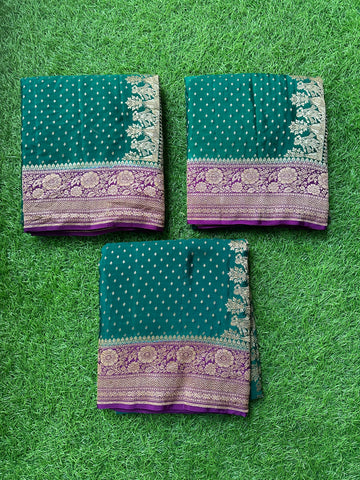 Peocock green with mejentha pure crepe Banaras handloom silk.