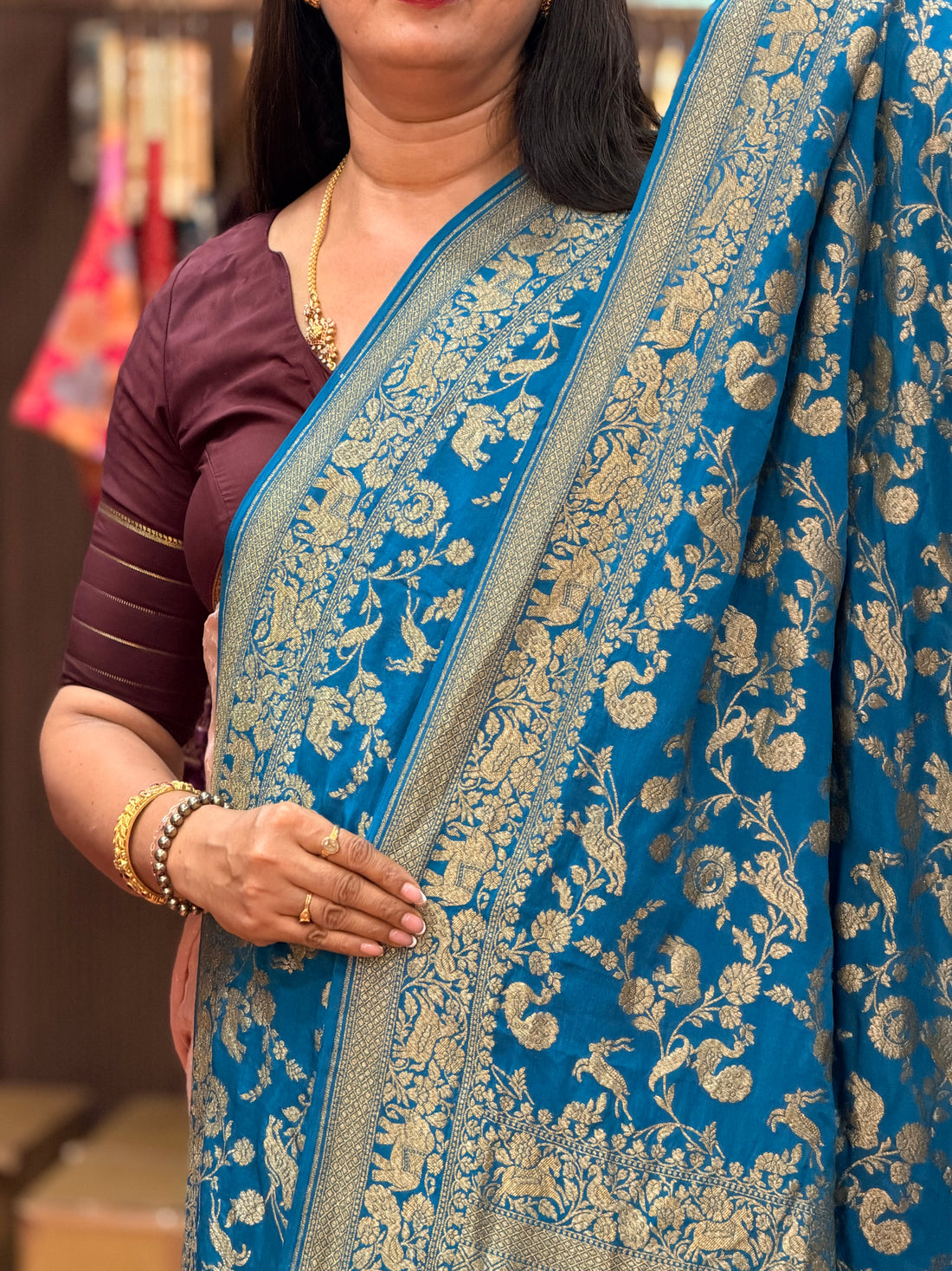 Peacock blue animal motive pure crepe Banaras