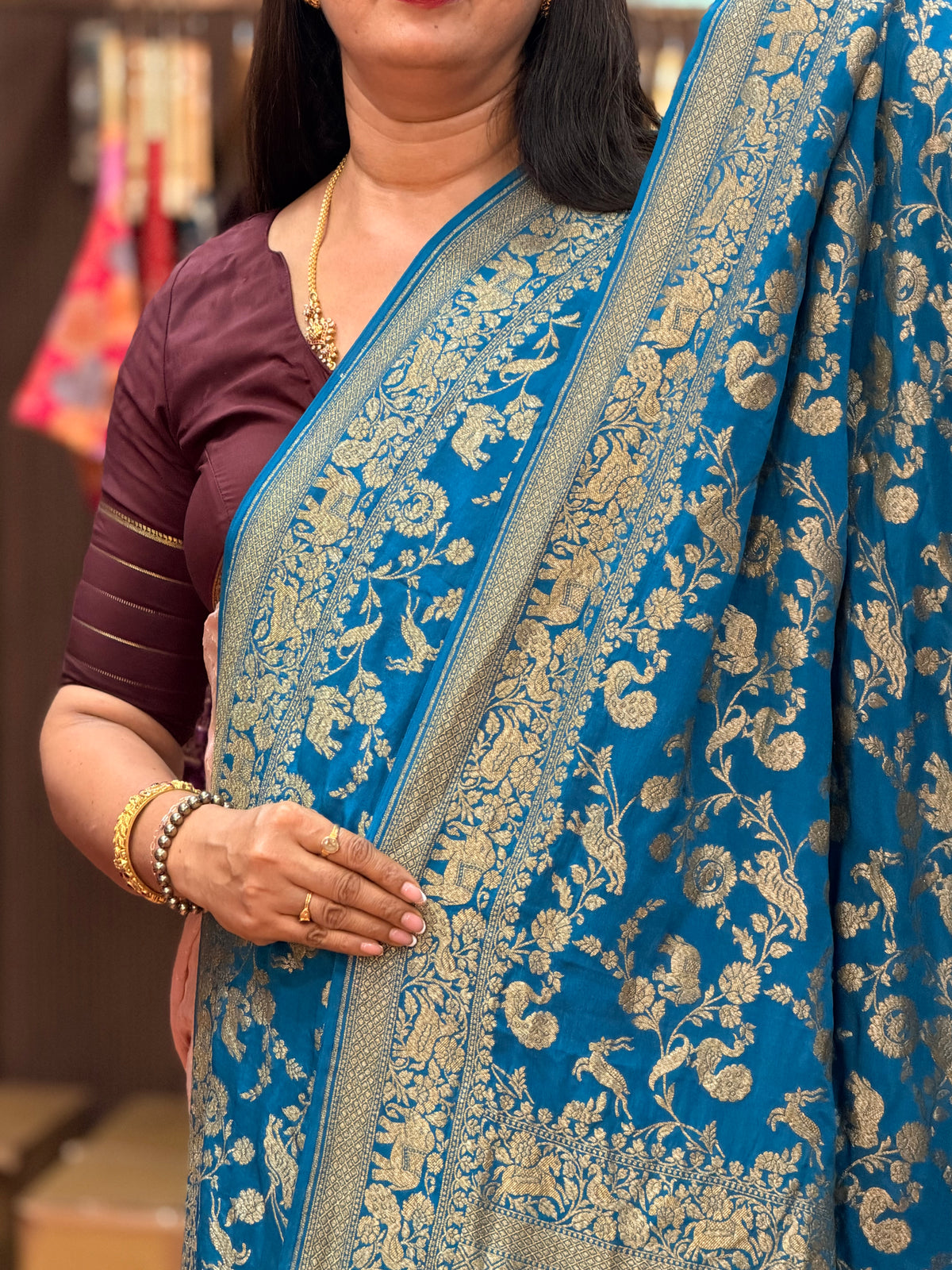 Peacock blue animal motive pure crepe Banaras