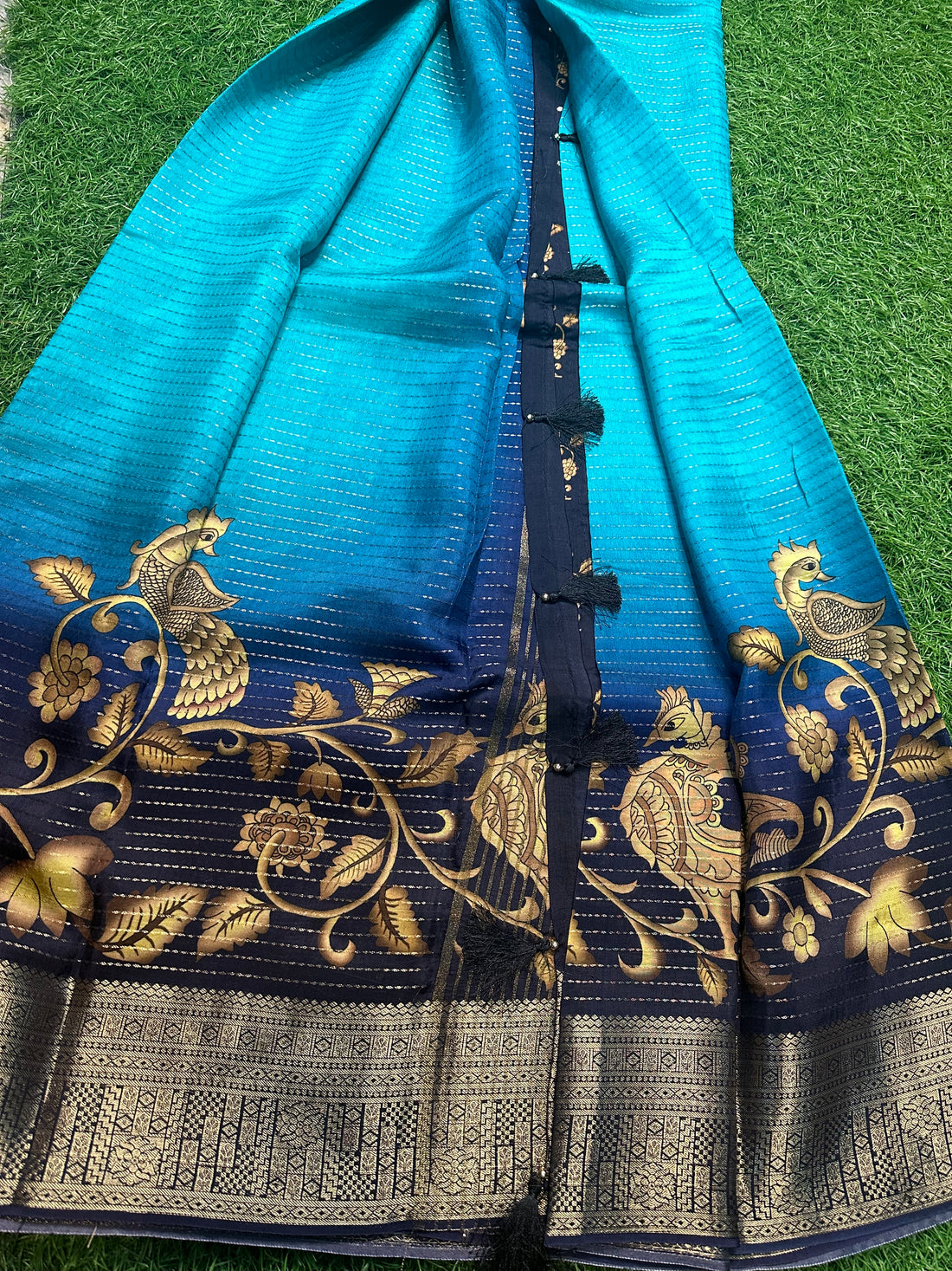 Sky blue with navy blue. Semi crepe kalamkari.