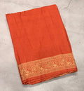 Rust orange Kanchi border plain modal silk saree