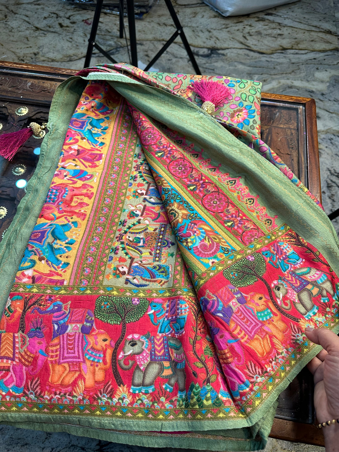 Parrot green pure moonga crepe Kashmiri work all over the body.