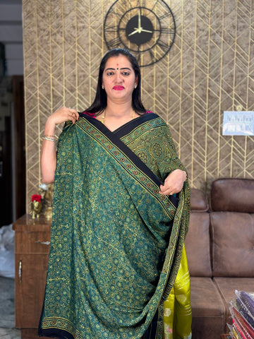 Green pure modal silk saree.