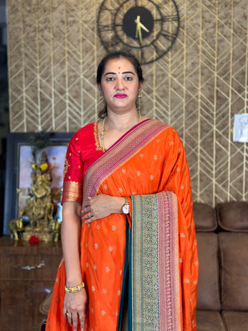 Orange and peacock green pure crepe Banaras.