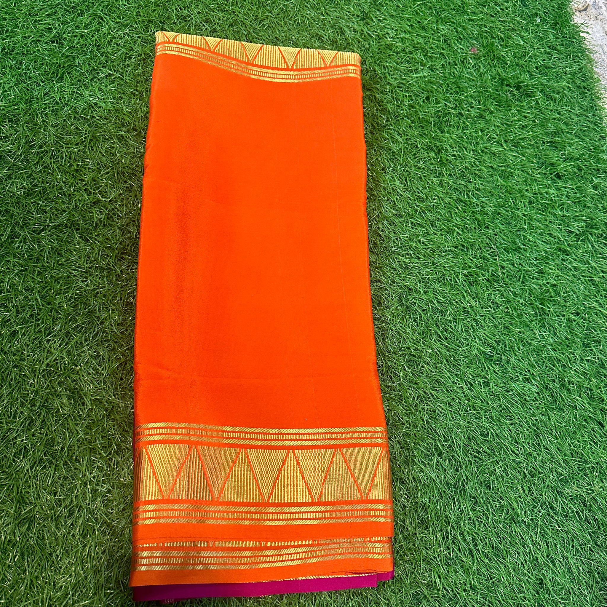 Orange and pink half and half Mysore Silk sarees.