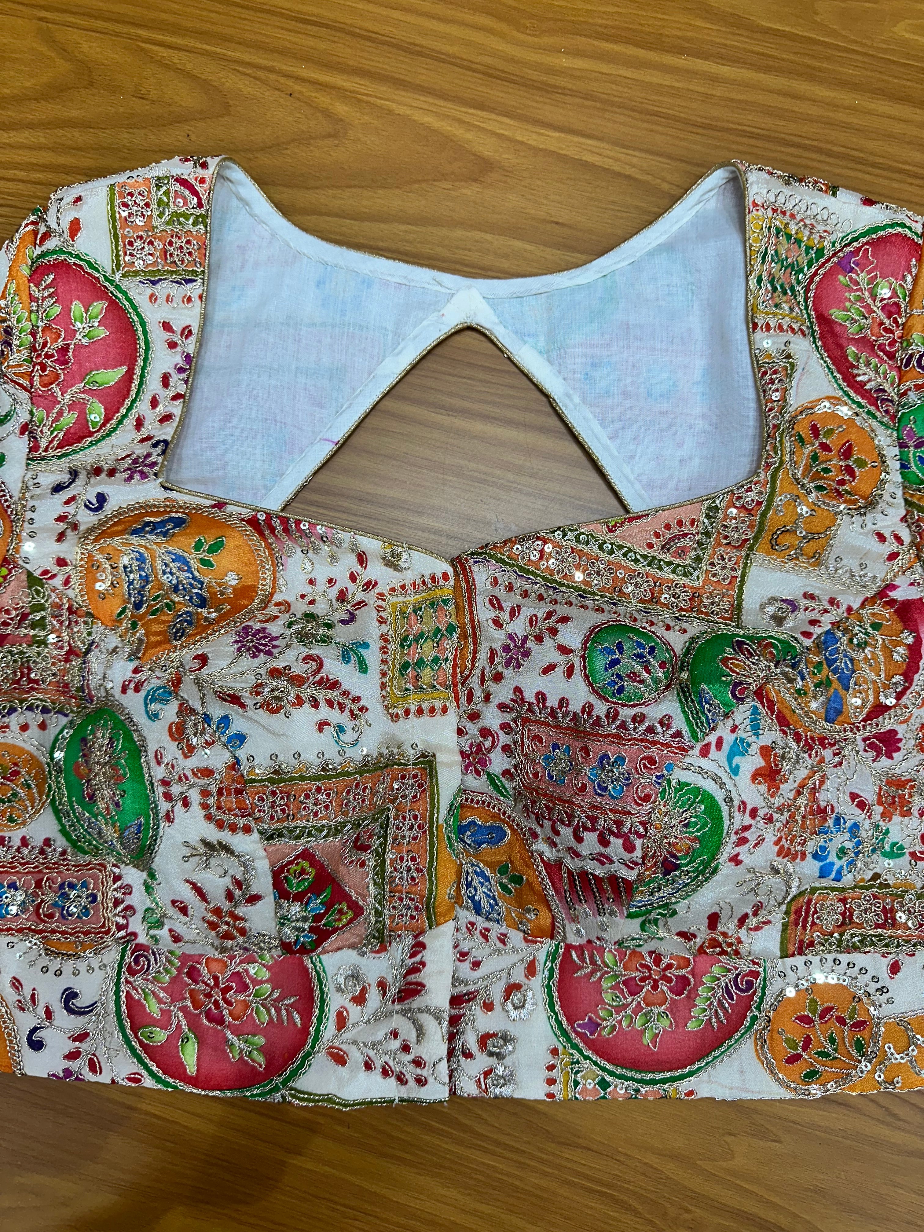 Half white heavy brocade Stiched blouse