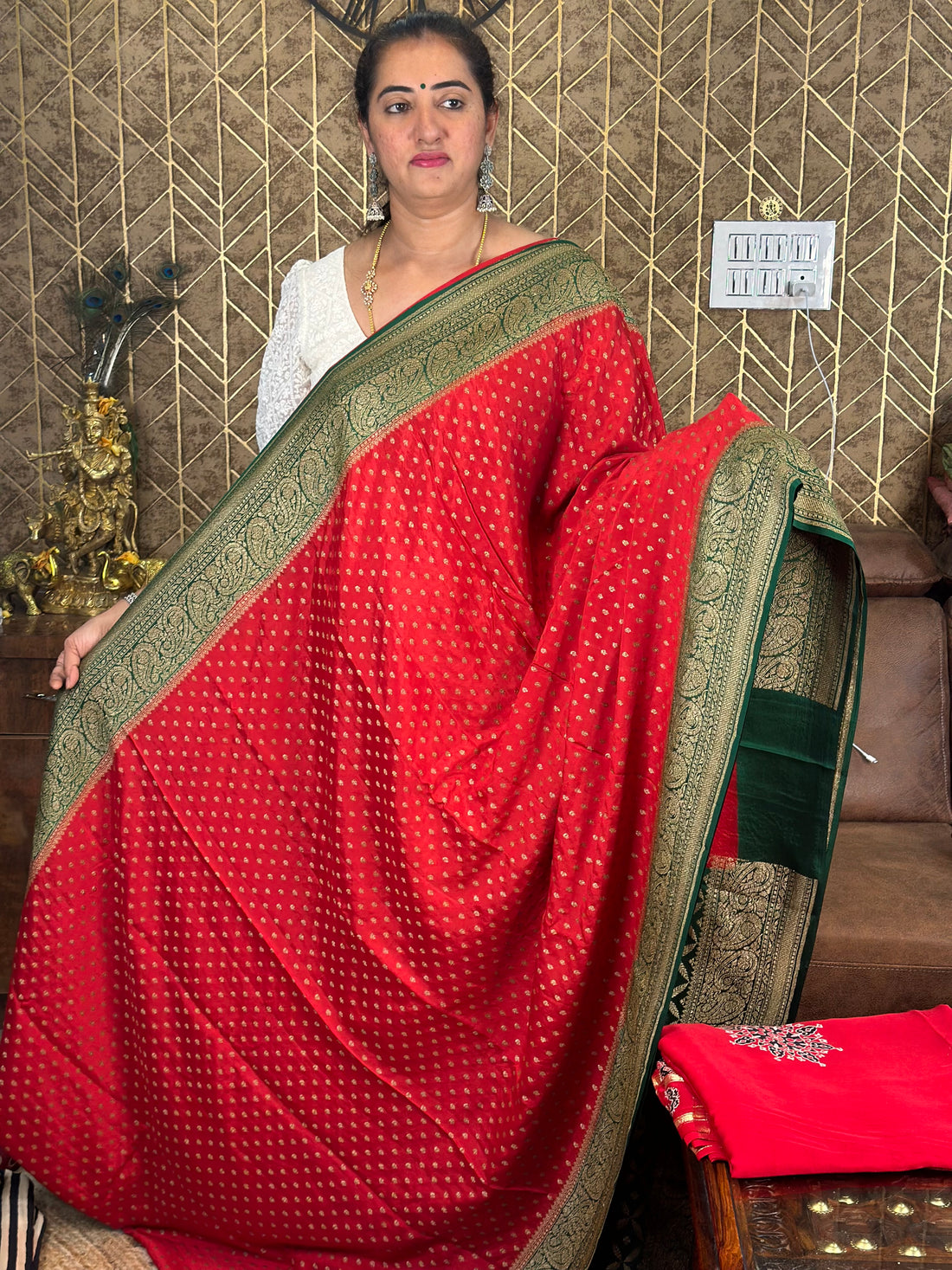 Red and green pure crepe Banaras silk sarees.