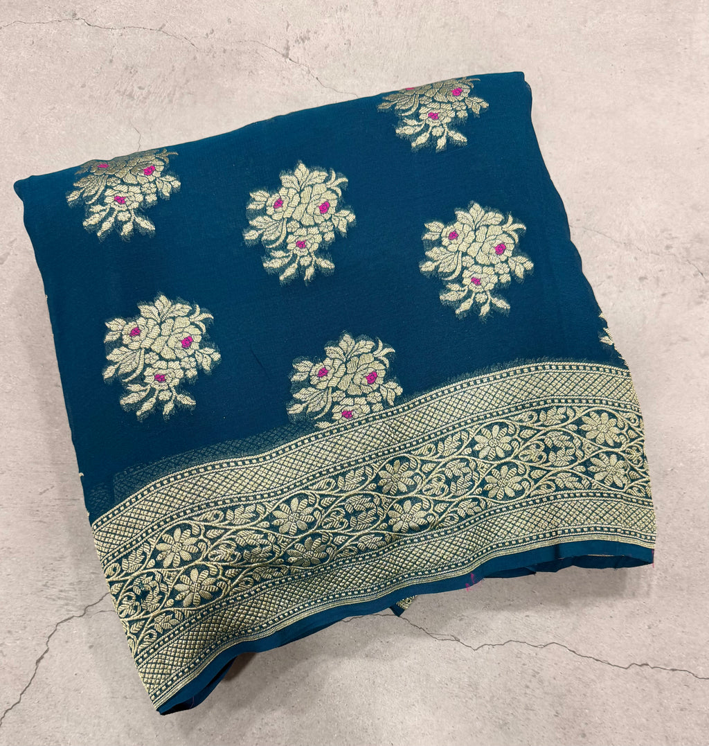 Peacock blue jaal pattern pure georgette with water zari saree