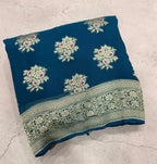 Peacock blue jaal pattern pure georgette with water zari saree
